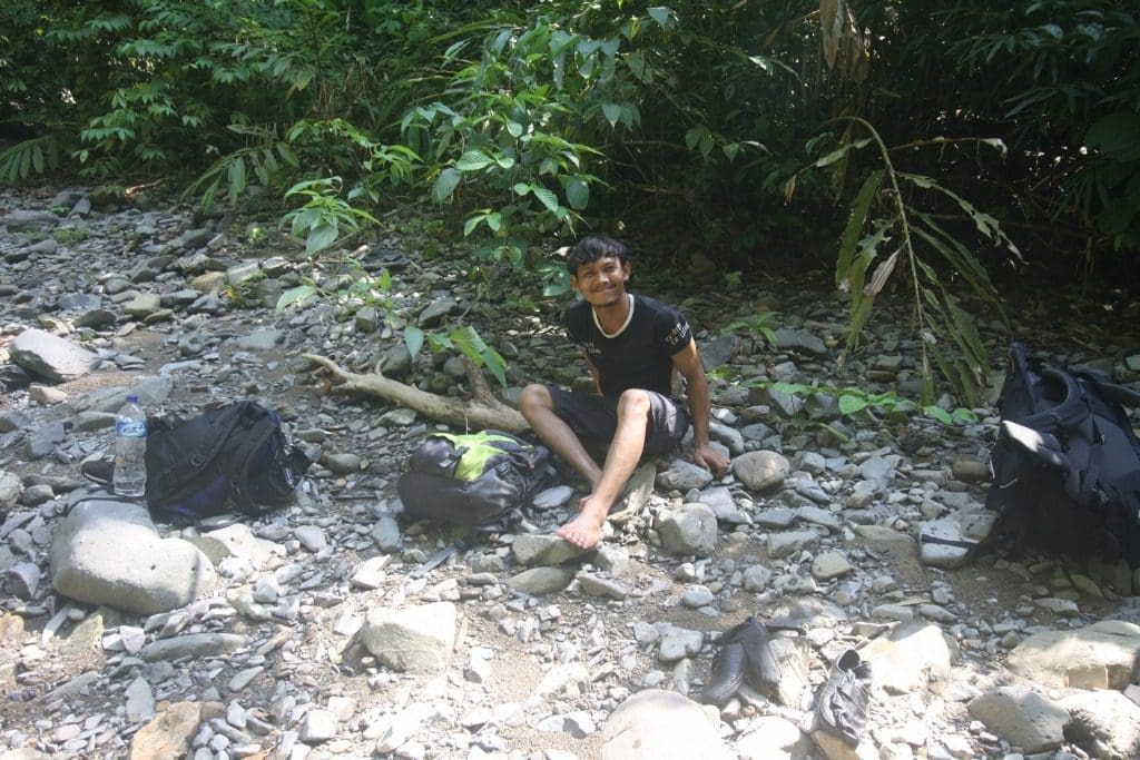 One of our guides resting, on the Jungle trek Sumatra Indonesia