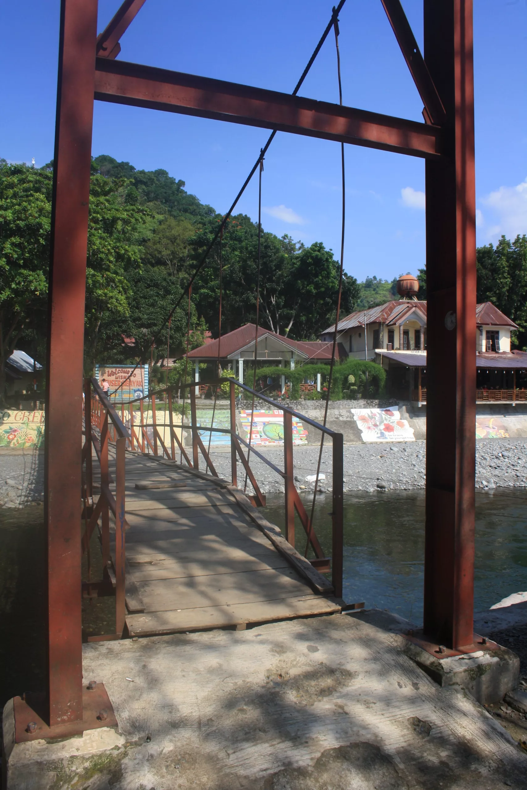 The suspension bridge to cross the river, Bukit Lawang