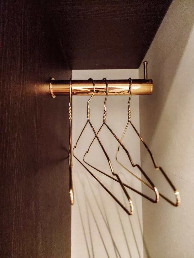 gold coat hangers in our room at The James Hotel Rotterdam, the best hotel in Rotterdam