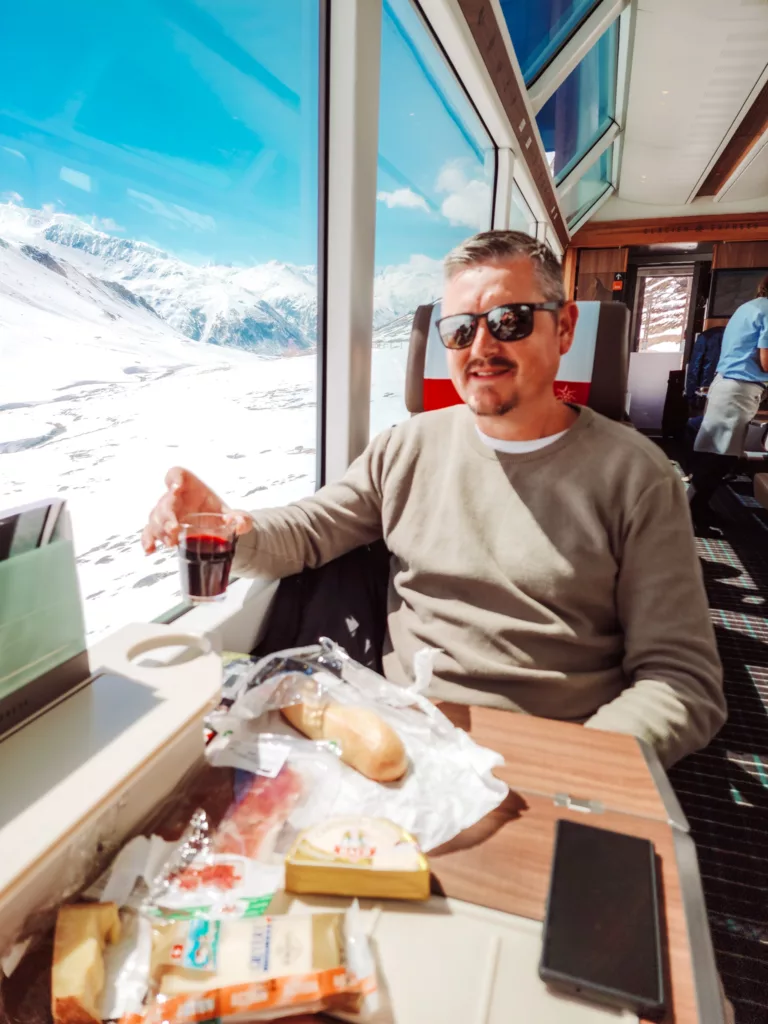 Enjoying Australian Penfolds wine and a picnic on the Glacier Express