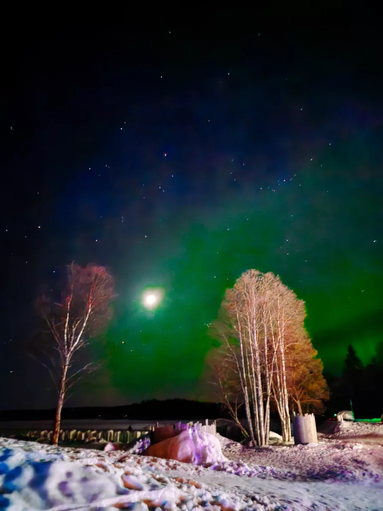 Mike out hunting northern lights at the Ice Hotel in Arctic Snow Hotel, Lapland Finland