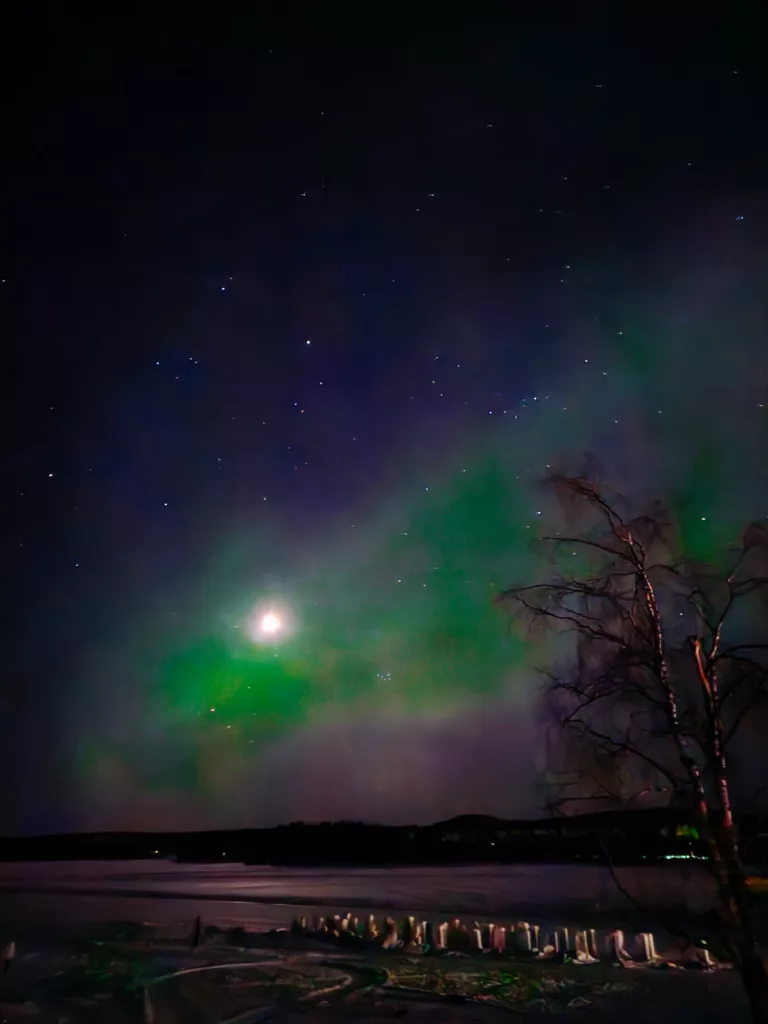 Mike out hunting northern lights at the Ice Hotel in Arctic Snow Hotel, Lapland Finland