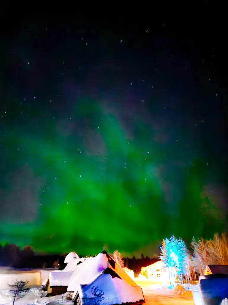 Mike out hunting northern lights at the Ice Hotel in Arctic Snow Hotel, Lapland Finland