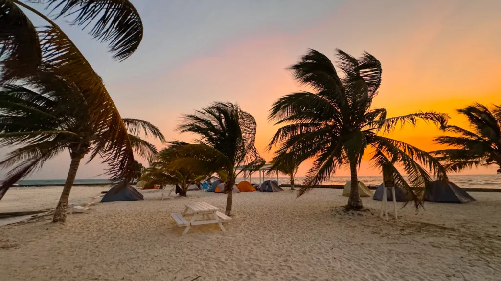 perfect sunrise on Rendezvous Caye with Ragga Sailing a must do in in Belize
