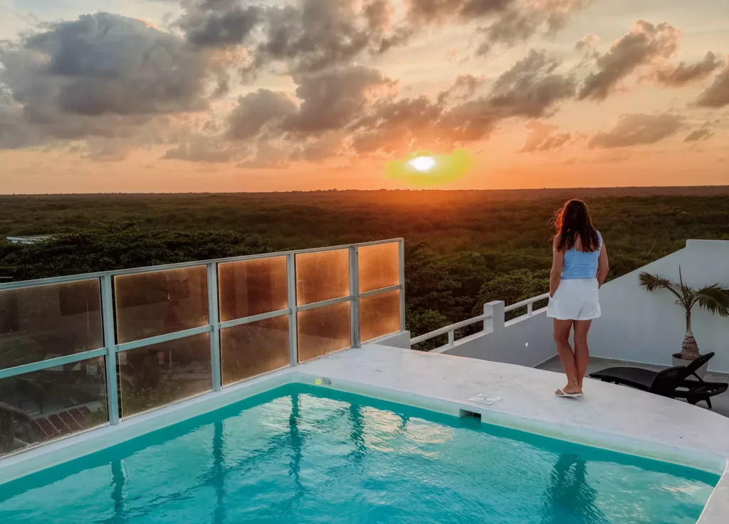 sunset at the roof top pool at Inkanto Luxury Hotel Mahahual Mexico Costa Maya