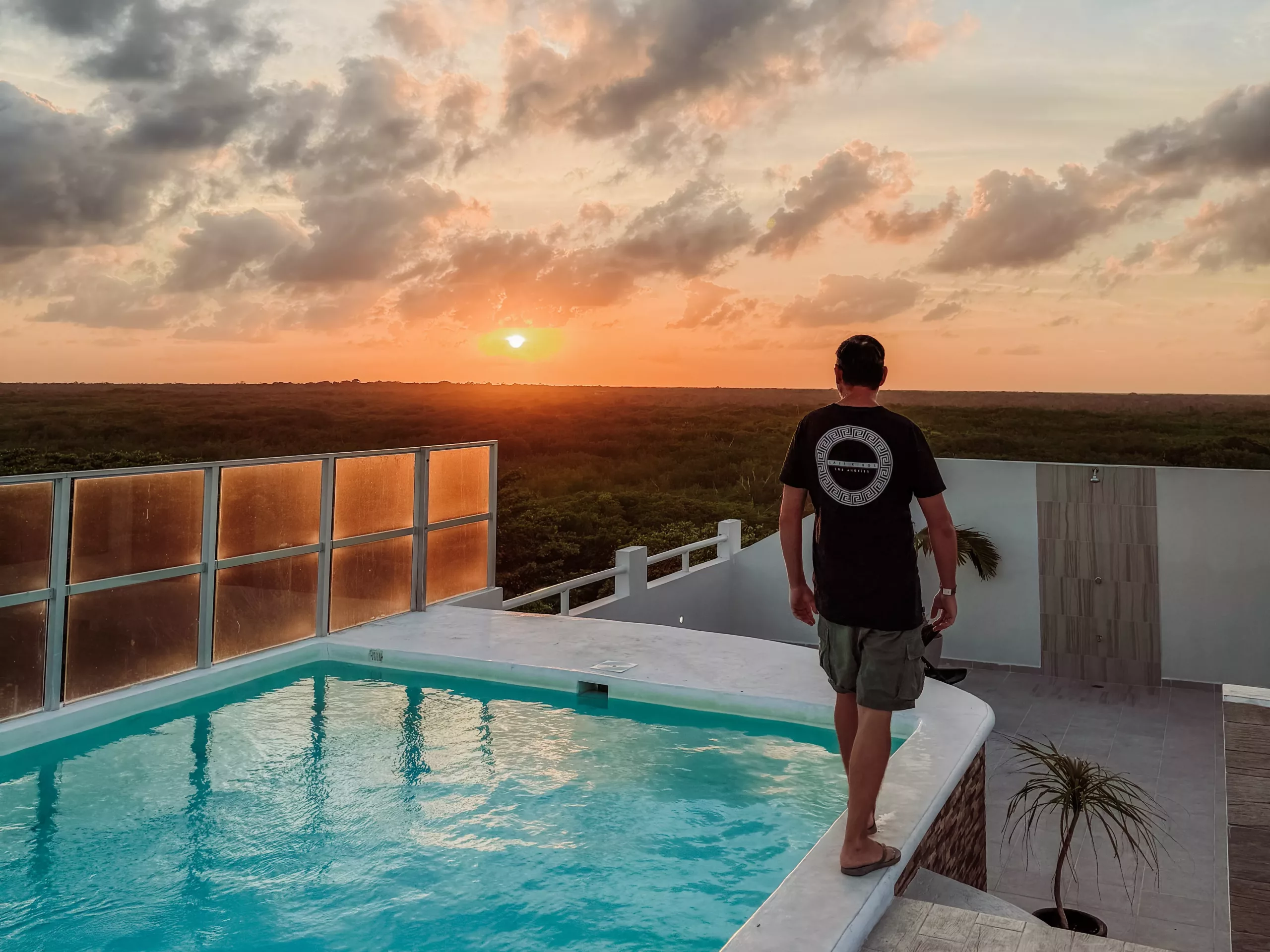 sunset at the roof top pool at Inkanto Luxury Hotel Mahahual Mexico Costa Maya